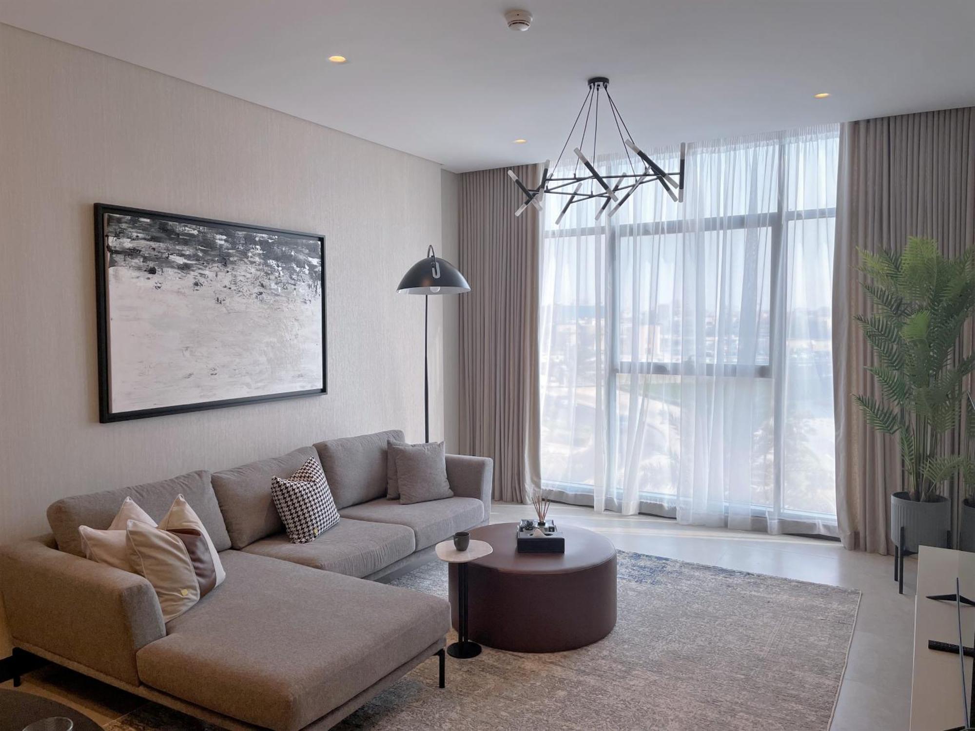Charthouse Bahrain Manama Exterior foto A living room in a typical apartment